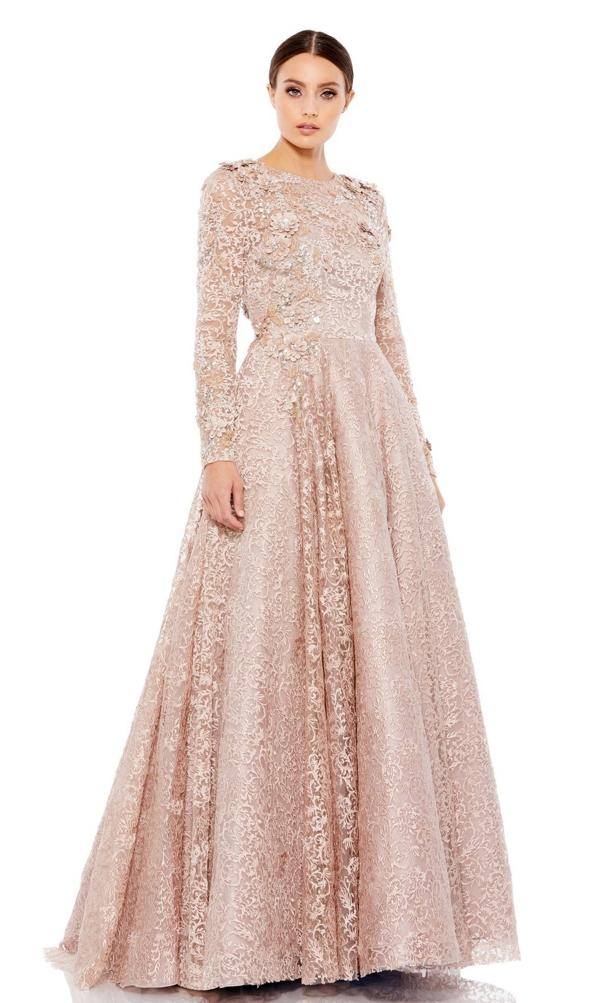A woman stands against a white background wearing the Mac Duggal 11121 Long Sleeve Mocha Formal Gown.